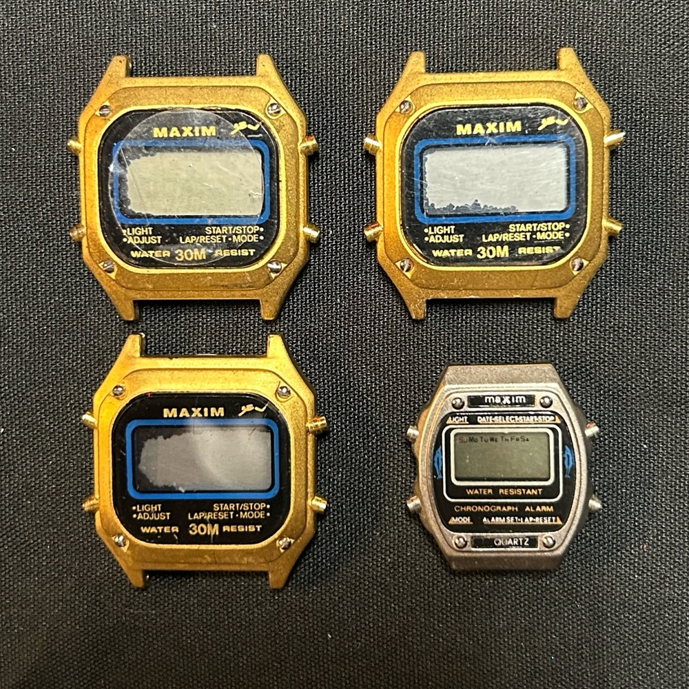 Lot Of 4 vintage Maxim digital watches. (Not Running)